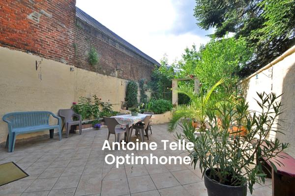 Maison d'habitation & commerce libre avec jardin clos en centre ville - Le Cateau