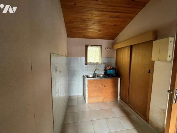 VILLECOMTAL/ARROS à 5min, maison à rafraichir de 138m² habitables sur 1778m² de terrain clos.