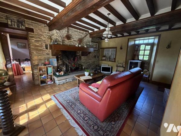 Très belle maison en pierre avec dépendances sur 1ha59 de terre libre.