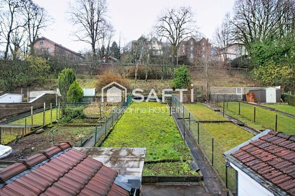 Maison mitoyenne de 100m2 avec terrasse;; jardin et garage