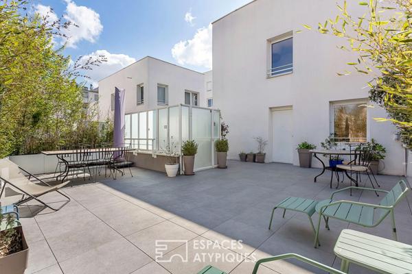 Appartement esprit maison sur le toit avec terrasse