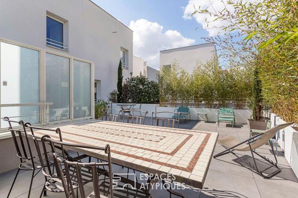 Appartement esprit maison sur le toit avec terrasse
