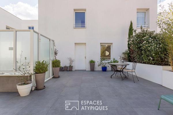 Appartement esprit maison sur le toit avec terrasse