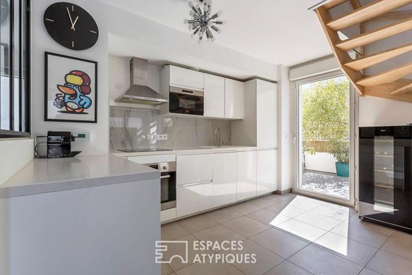 Appartement esprit maison sur le toit avec terrasse