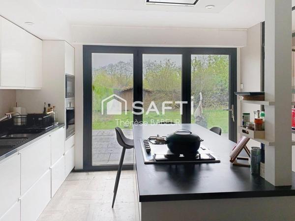 Maison individuelle à proximité du tramway / Marcq Institution / Jeannine Manuel