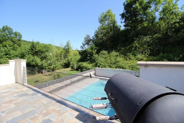 Belle maison individuelle avec sous-sol complet – Piscine – Terrain 1 169 m² – Hautecourt-Romanèche (01250)