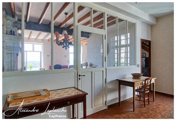 Dpt Tarn et Garonne (82), à vendre LAUZERTE maison de ville en pierre 9 pièces de 205m² avec jardin et garage.