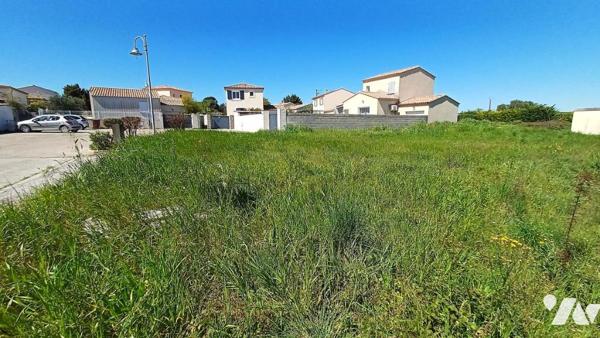 TERRAIN A BATIR DANS UN LOTISSEMENT AVEC LES VIABILITES EN BORDURE 