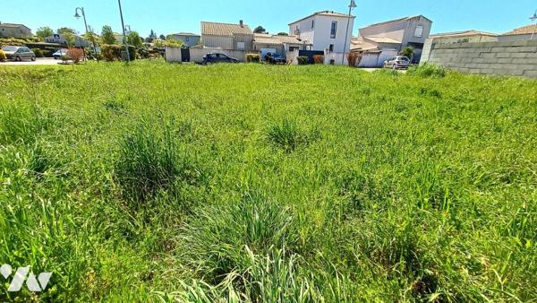 TERRAIN A BATIR DANS UN LOTISSEMENT AVEC LES VIABILITES EN BORDURE 