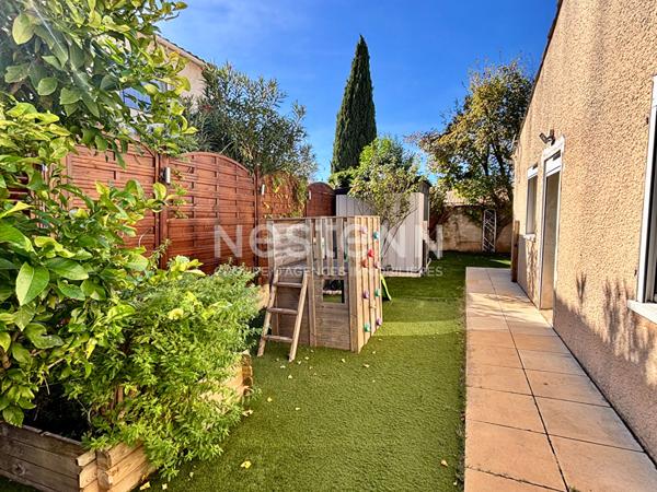 Maison de type 4 d'environ 126m² avec véranda, jardin, piscine et garage