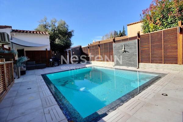 Maison de type 4 d'environ 126m² avec véranda, jardin, piscine et garage