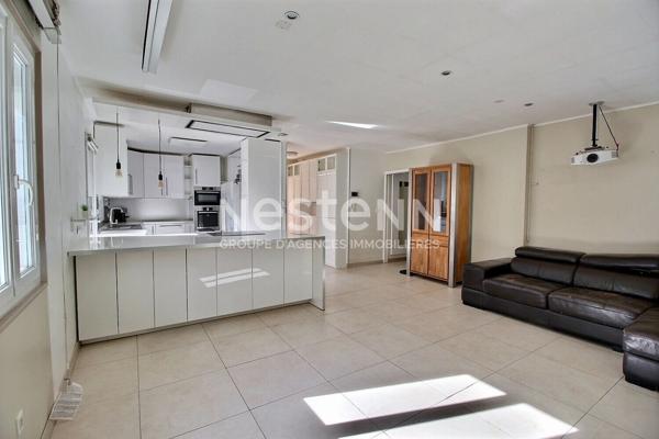 Maison de type 4 d'environ 126m² avec véranda, jardin, piscine et garage