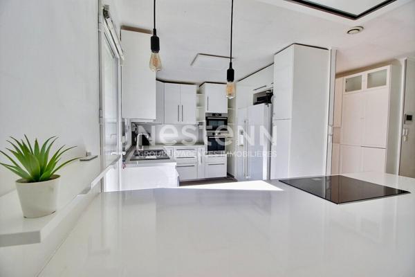 Maison de type 4 d'environ 126m² avec véranda, jardin, piscine et garage