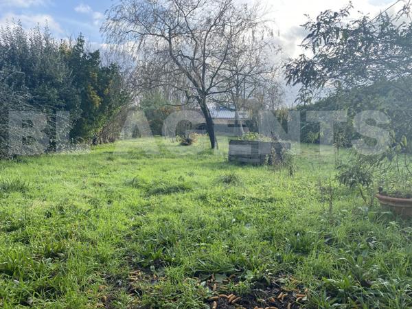 Maison de ville de caractère avec terrain constructible à la Flèche 
