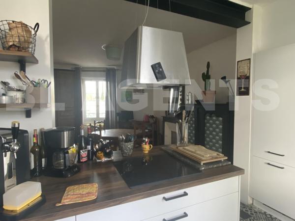 Maison de ville de caractère avec terrain constructible à la Flèche 