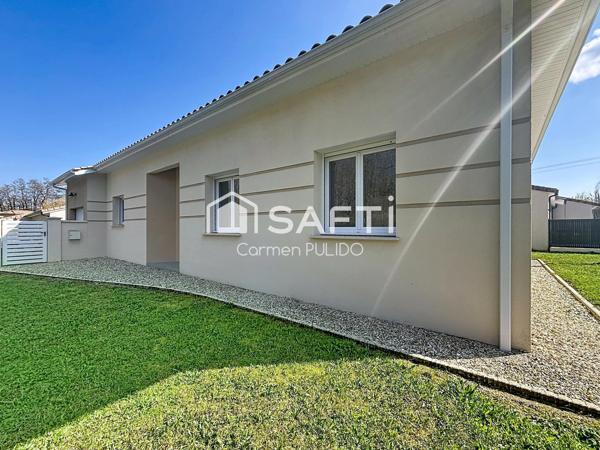 Maison contemporaine entièrement de plain-pied de 99 m² : 3 chambres, garage et jardin dans un environnement calme et proche des commerces.