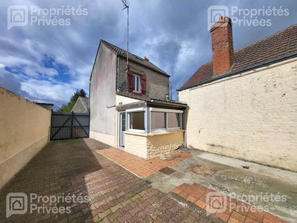 Ensemble de deux maisons, cour et jardin