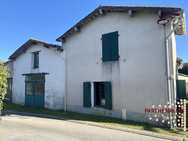 Maison de bourg avec jardin et garage