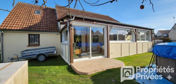 Maison et son jardin d'hiver