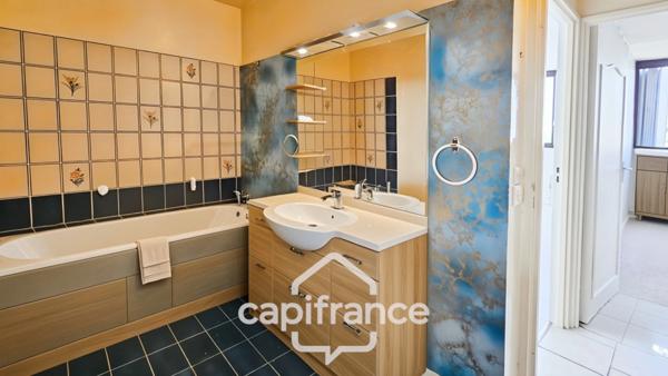 DUPLEX-BOX-PLACE DE STATIONNEMENT-TERRASSE 20 m2.