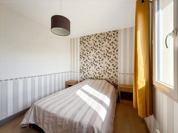 Maison récente plain-pied 3 chambres avec véranda dans un cadre paisible