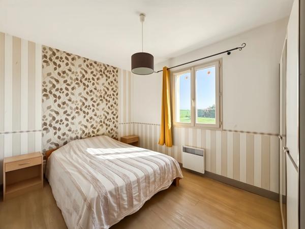 Maison récente plain-pied 3 chambres avec véranda dans un cadre paisible