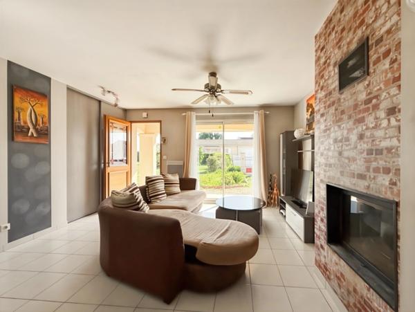 Maison récente plain-pied 3 chambres avec véranda dans un cadre paisible