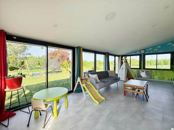 Maison récente plain-pied 3 chambres avec véranda dans un cadre paisible