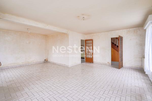 Maison sur sous sol proche du centre sur terrain de 1000 m² constructible