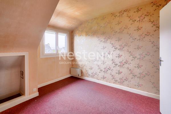 Maison sur sous sol proche du centre sur terrain de 1000 m² constructible