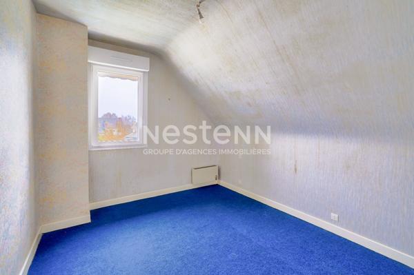Maison sur sous sol proche du centre sur terrain de 1000 m² constructible