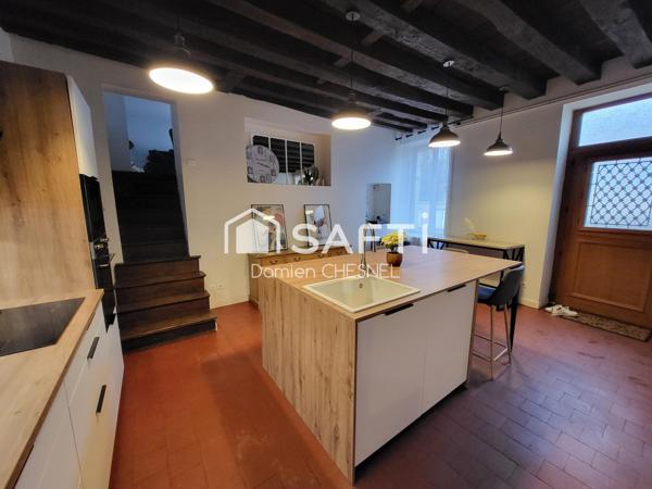 Maison de charme avec terrasse, garage et cave en plein centre-ville