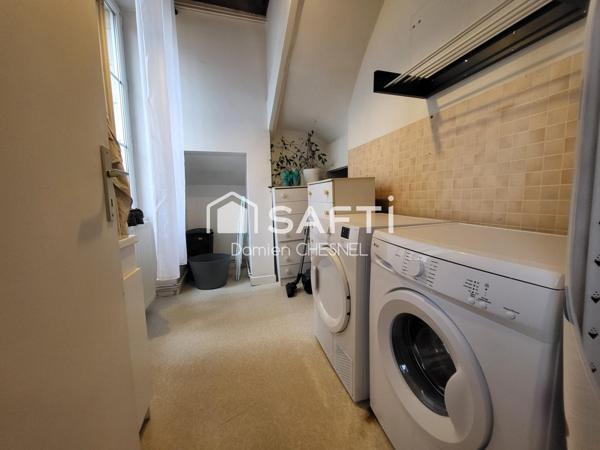 Maison de charme avec terrasse, garage et cave en plein centre-ville