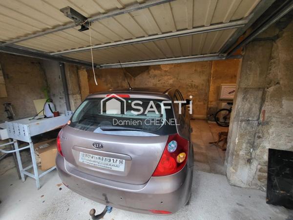 Maison de charme avec terrasse, garage et cave en plein centre-ville