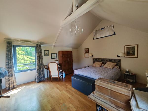 Accès rapide à Lisieux, ensemble maison et dépendance aménagée sur un parc paysagé de 5914 m²