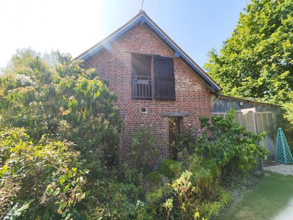 Accès rapide à Lisieux, ensemble maison et dépendance aménagée sur un parc paysagé de 5914 m²