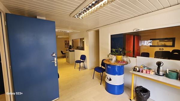 IMMEUBLE A USAGE DE BUREAUX ET COMMERCE