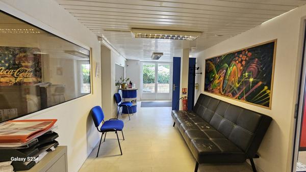 IMMEUBLE A USAGE DE BUREAUX ET COMMERCE