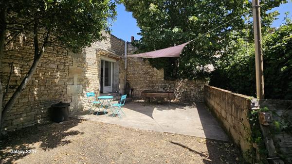 IMMEUBLE A USAGE DE BUREAUX ET COMMERCE