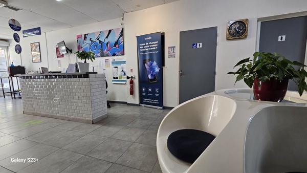 IMMEUBLE A USAGE DE BUREAUX ET COMMERCE