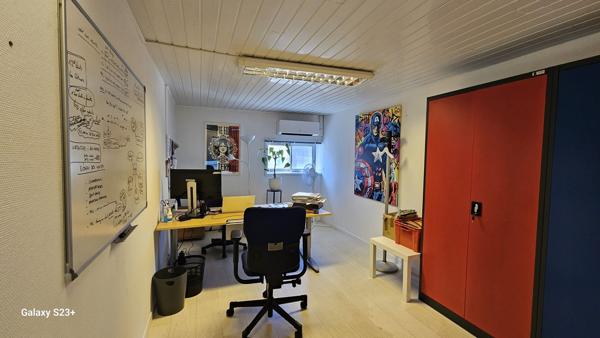 IMMEUBLE A USAGE DE BUREAUX ET COMMERCE