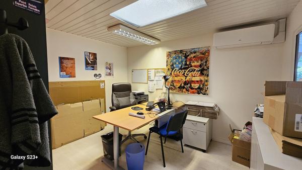 IMMEUBLE A USAGE DE BUREAUX ET COMMERCE