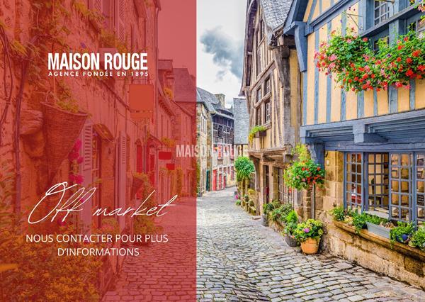 Dinan centre ville style loft avec garage et 4 chambres .