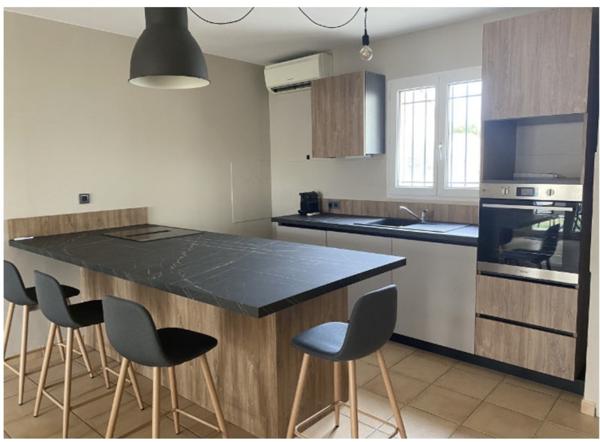 Appartement au rez de chaussée avec jardinet et garage