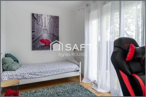 Appartement type maison au calme, garage et stationnement libre dans copro