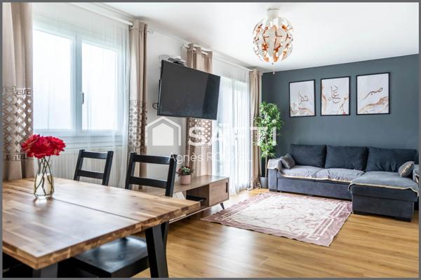 Appartement type maison au calme, garage et stationnement libre dans copro