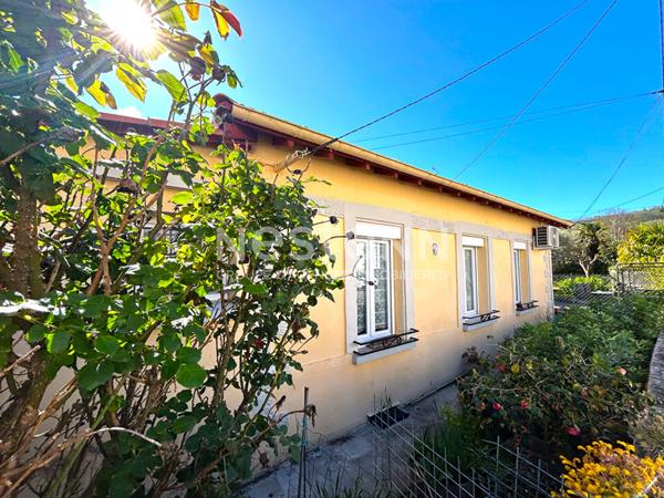 MAISON DE PLAIN PIED AVEC VERANDA ET COIN JARDIN