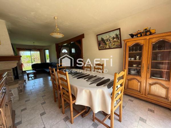 Maison avec sous-sol sur beau terrain arboré