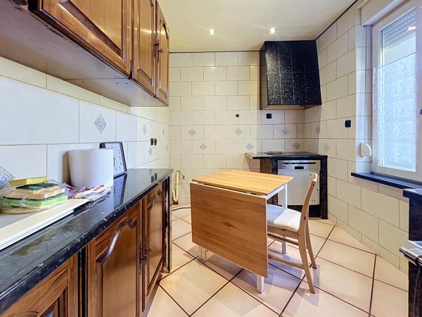 Maison familiale 4 chambres avec jardin et garage à Thionville.