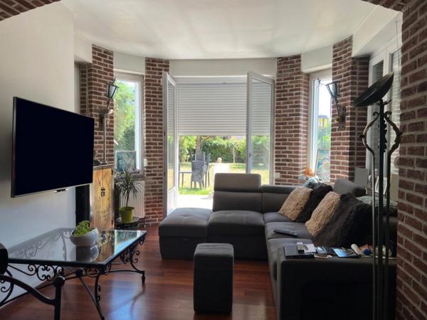 Appartement T3 de standing de 115 m² en plain pied avec terrasse et jardin privatif